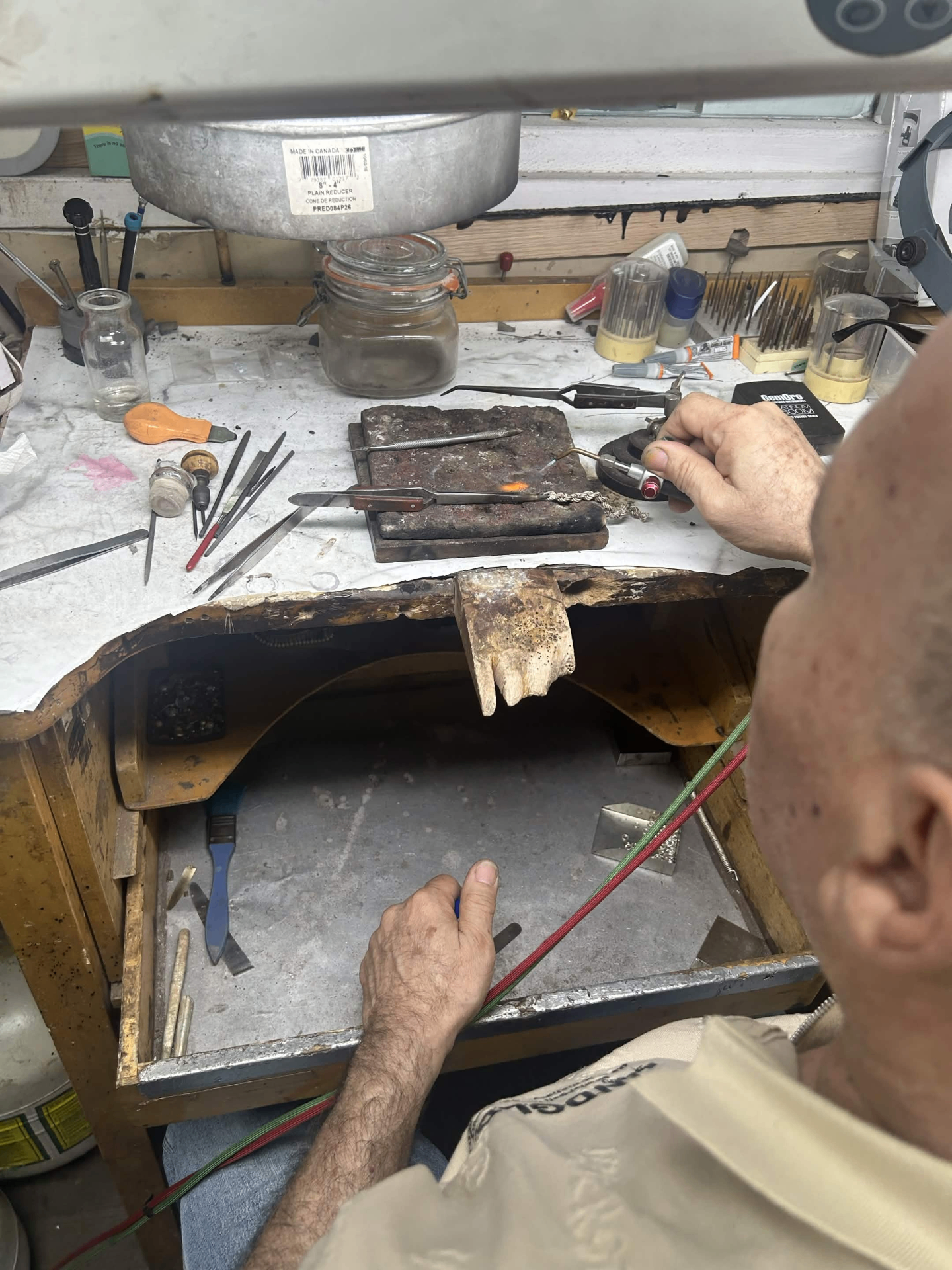 A Milvan master jeweler at the workbench